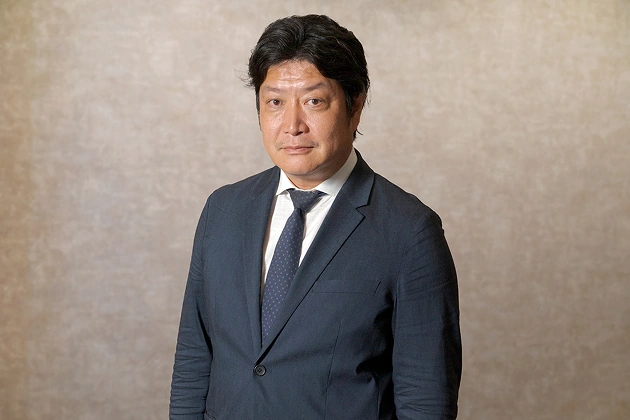 取締役：洞口 久教（Hisanori Horaguchi）